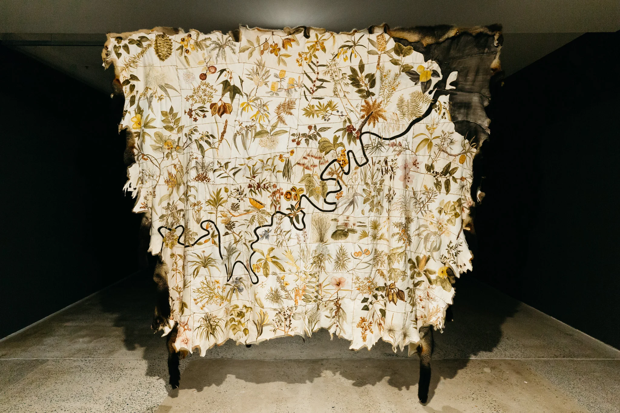 Carol McGregor, Skin Country , 2018. Possum skins, ochre, binder medium, waxed thread. Photography by Markus Ravik.