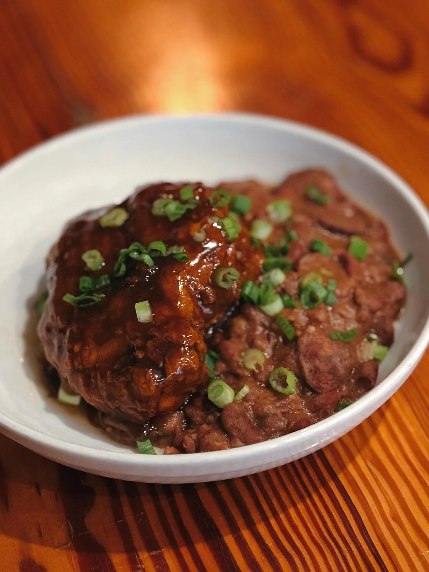 One of Our Signature Entr&eacute;es, The Jerk Fried Chicken &bull; Boneless Chicken Breast Tossed in Our Housemade Jerk Sauce over Red Bean &amp; Smoked Sausage Cassoulet and Louisiana Rice! 🍽 Open 11AM-9PM!