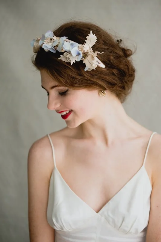 Vintage Floral Headpieces A dramatic floral crown or side comb is the perfect finishing touch for your Boho bridal style. But why worry about fresh flowers wilting when you can choose a vintage floral headpiece. These are often made with petals of silk and velvet and decorated with pearls and beading.