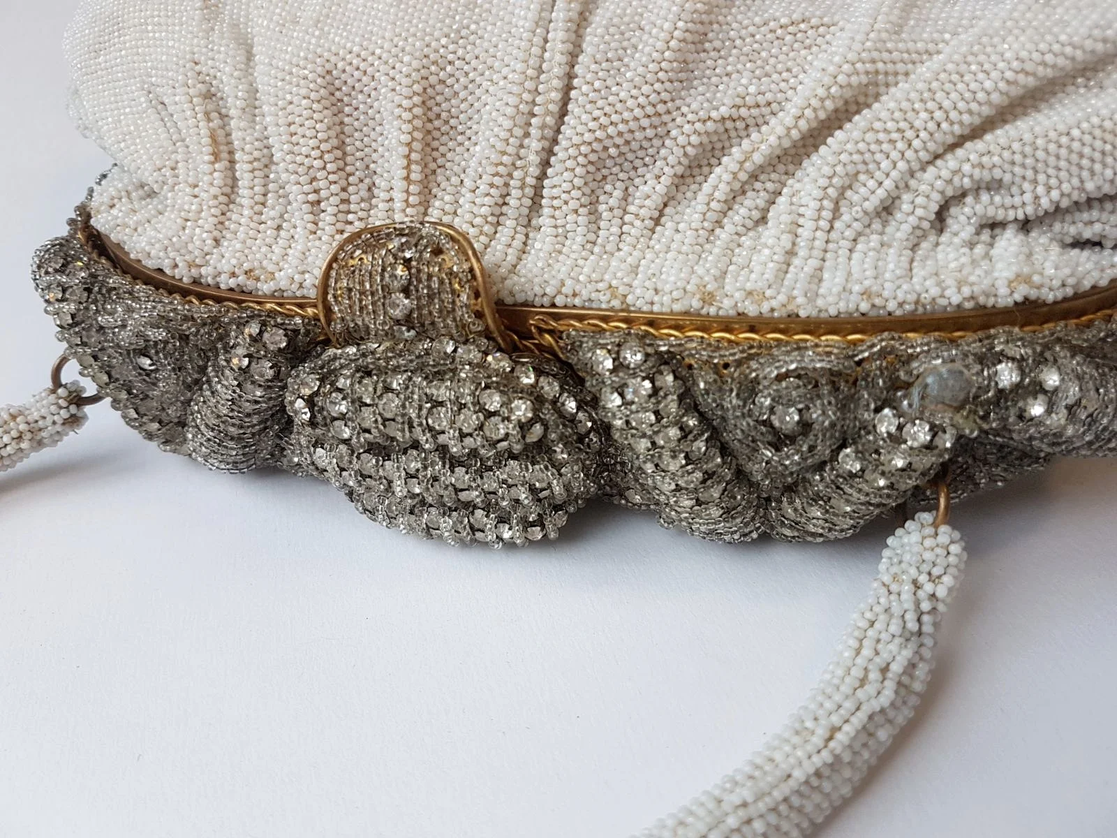 Bags You’ll still want your lipstick and phone on your wedding day, right? We have beautiful beaded evening bags from the 1950’s and 60’s that are the perfect size for essentials and pretty enough to match your wedding dress.