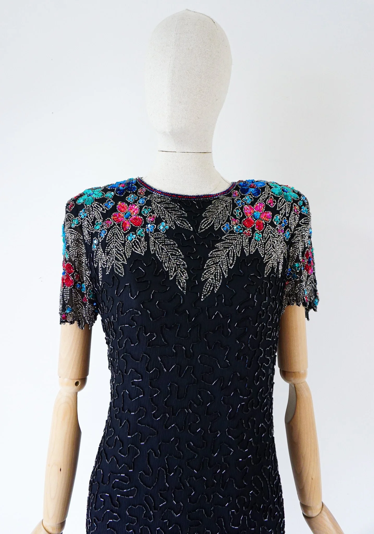 1980s Black silk beaded party dress with keyhole back, sz 8. 1980s Black silk beaded party dress with keyhole back, sz 8.