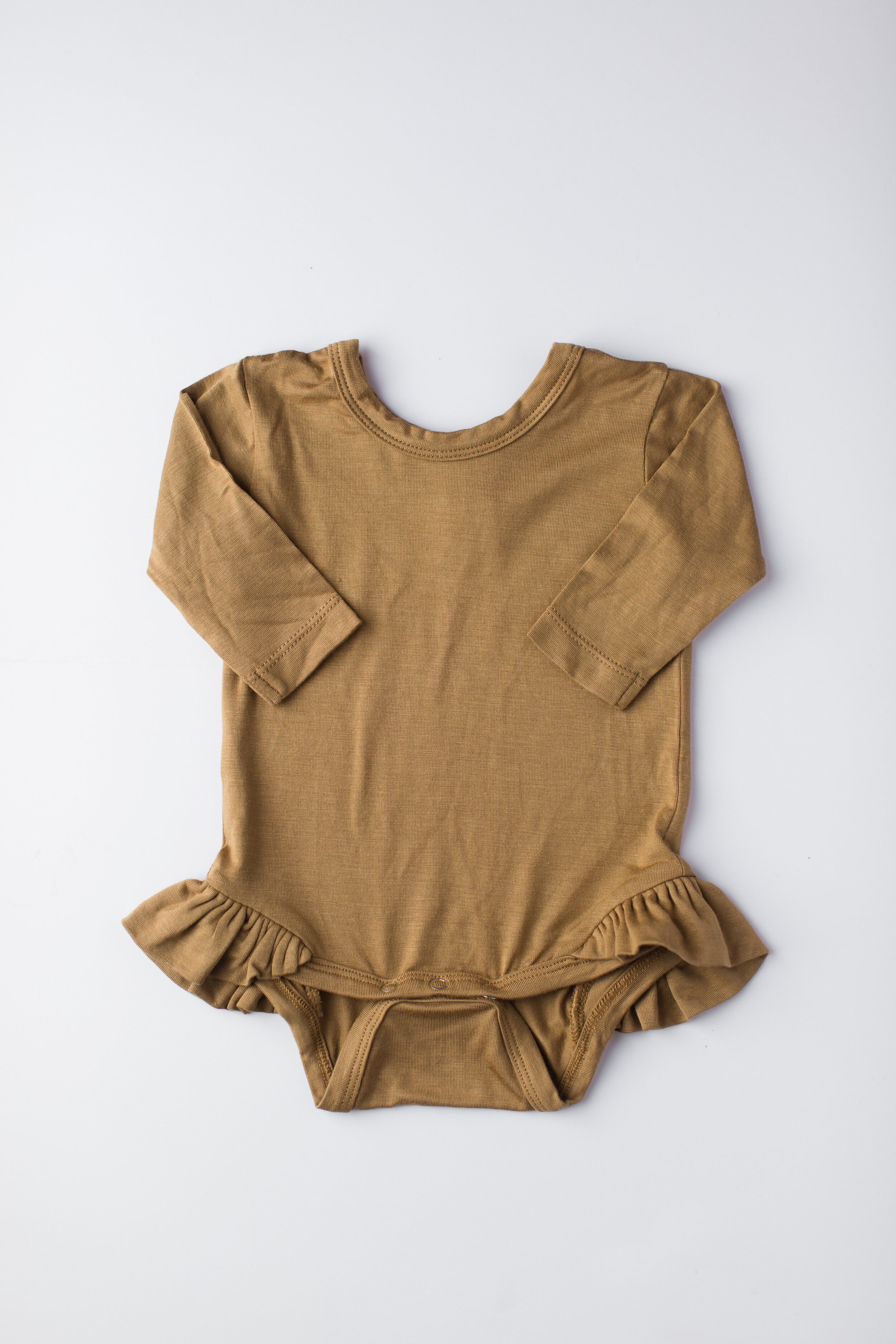 long sleeve bamboo ruffle bodysuit | dijon | size 0-3 m