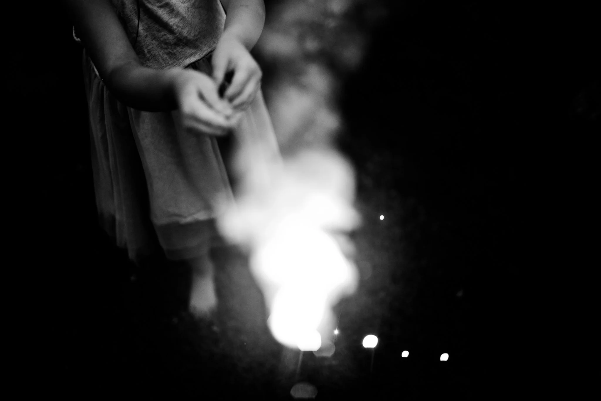 Child plays with sparklers