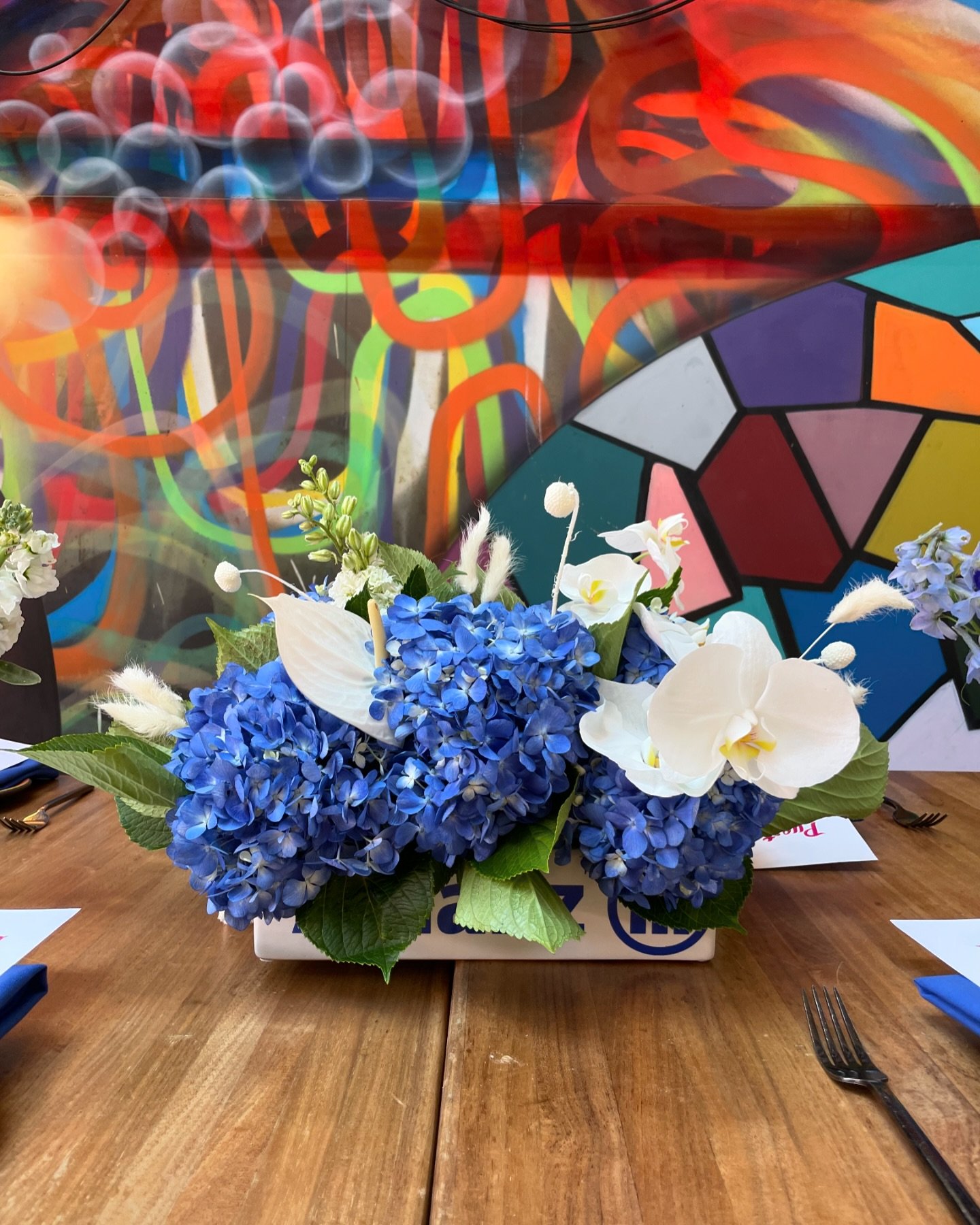 Blue blooms stealing the show in this vibrant floral arrangement! 💐💙&rdquo;

Floral Design | @sevenstems 
DMC Partner | @hostsglobal 
Venue | Puesto San Diego