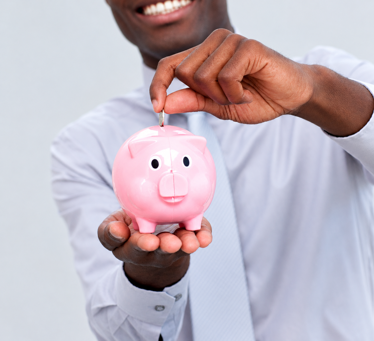 Smiling Man Saving with Piggy Bank.png