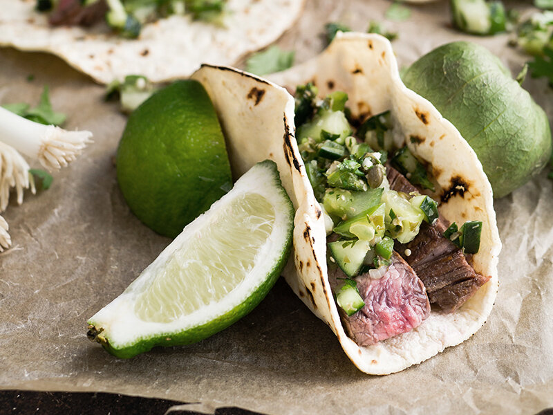 Taco with lime wedges