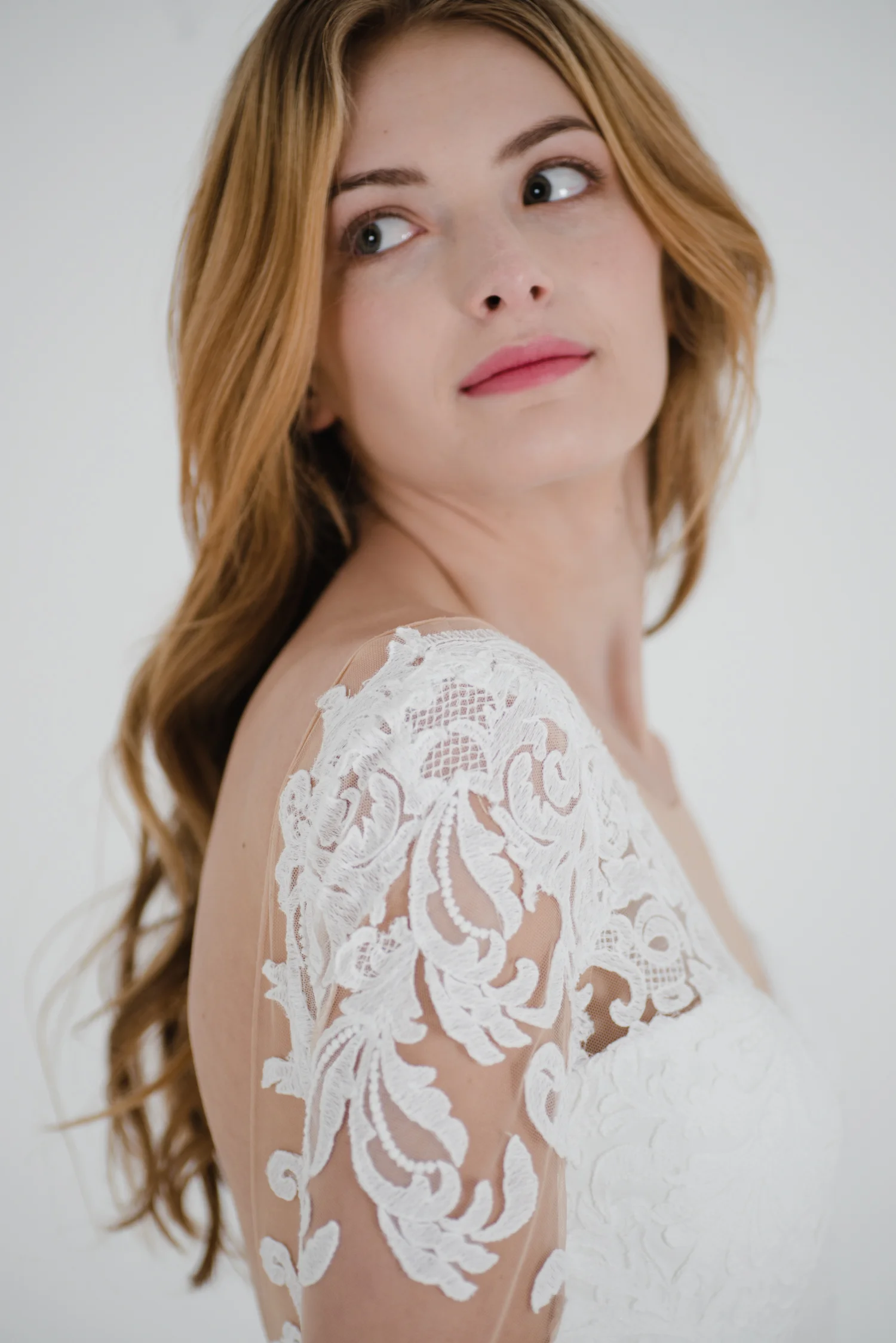 Desiree gown wedding gown with intricate lace and applique detailed sleeves and bodice