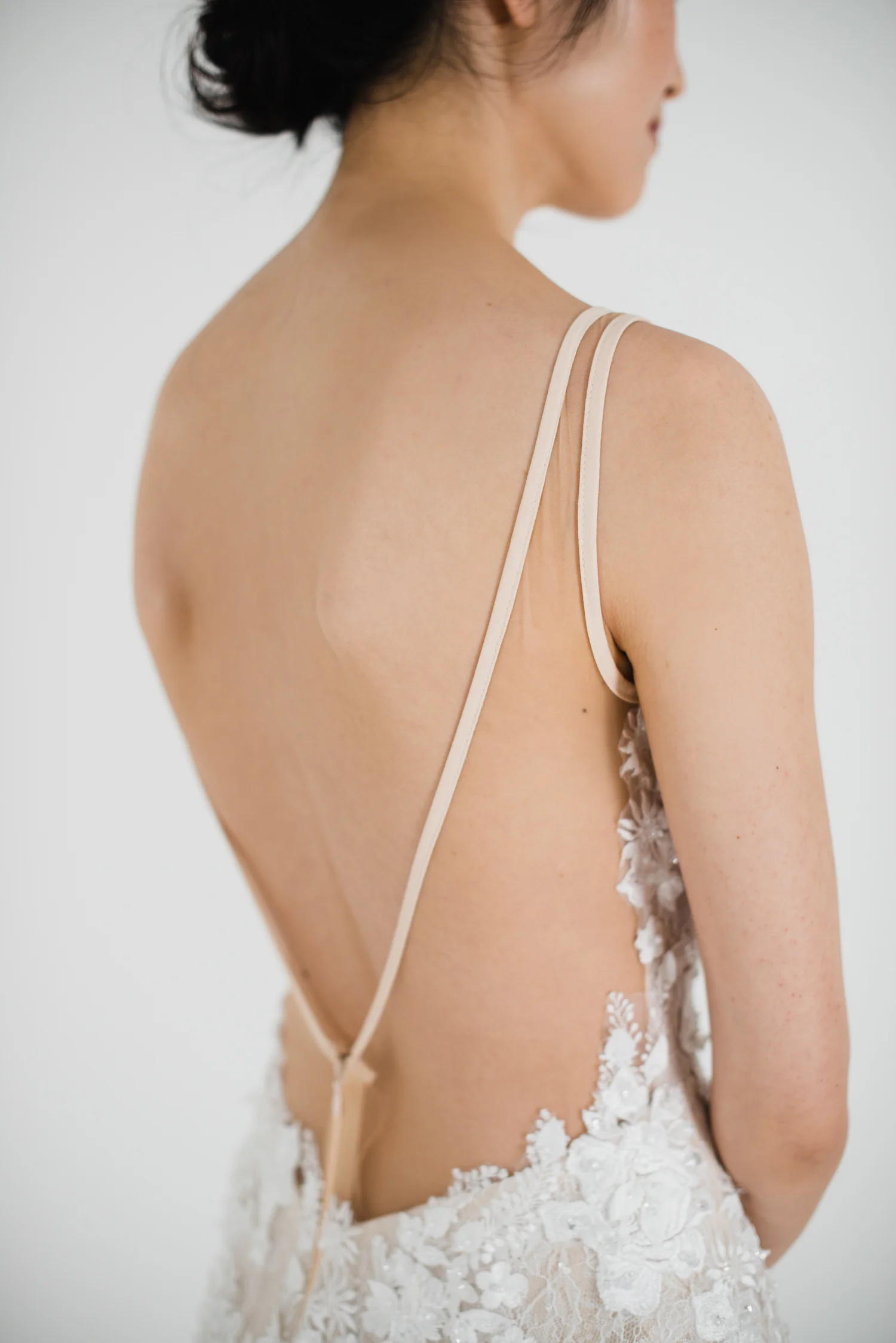 Thea gown wedding dress with plunging illusion back and floral lace details