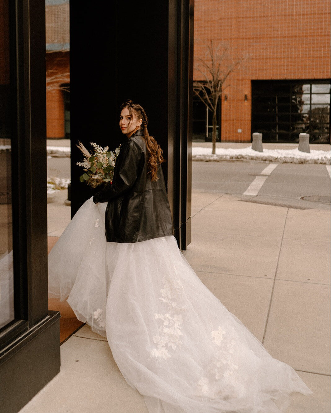 The grunge look has been taking over everyday fashion, but who says that can&rsquo;t apply to bridal fashion as well? We love a good faux-leather jacket and Dr. Martens ensemble and they just so happen to go perfectly with our Grace gown! In this sty