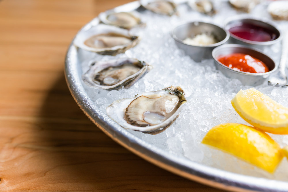 Raw NC oysters on the half shell at Locals Oyster Bar | Photo Credit: Owen Scott Jordan.jpg