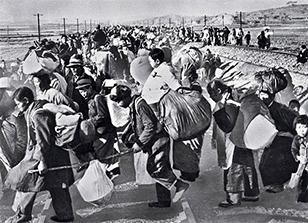 South Koreans flee south after the North Korean army invades.