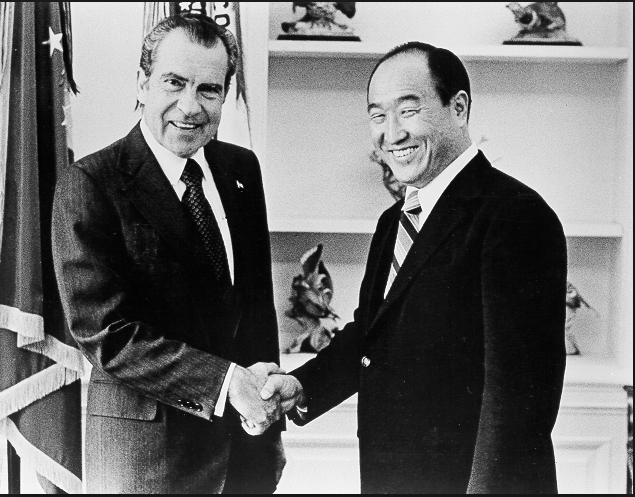 True Father shaking hands with Richard Nixon