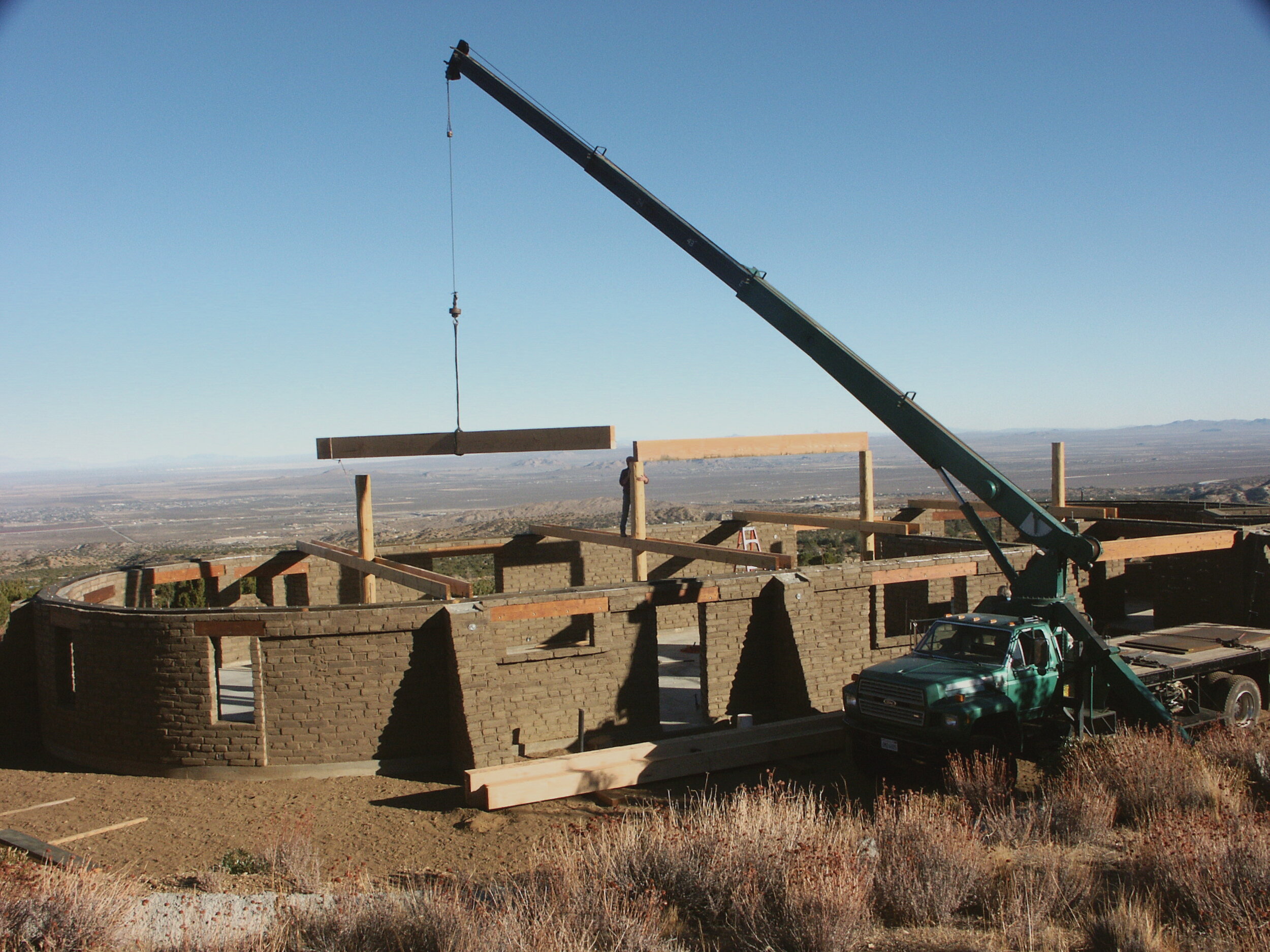 Fig. 13-5 Truck crane placing 12x16x 20-ft. beam.JPG