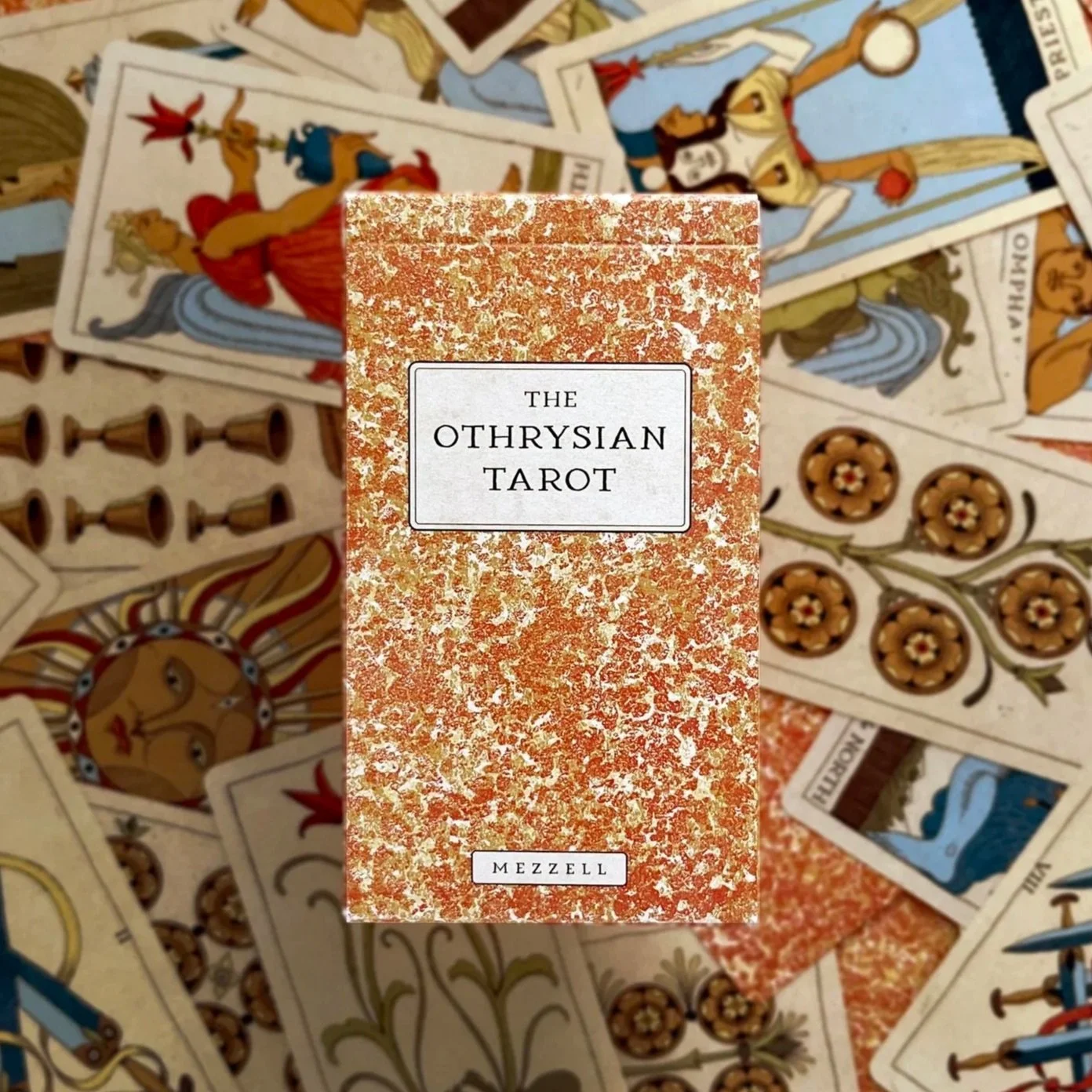 A hand holding a beautifully illustrated Lilifer tarot card