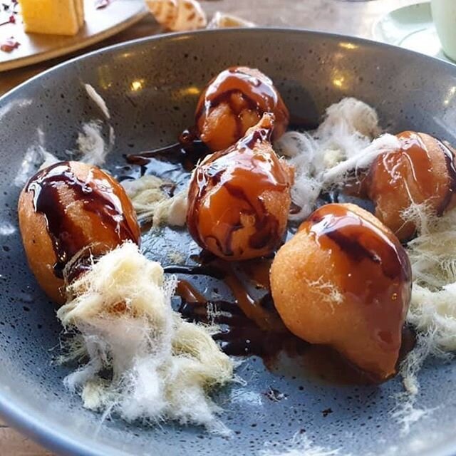 Loukoumades
Deep-fried doughnut balls soaked in honey syrup
served with chocolate sauce and dulce de leche
📷 Nick Giles