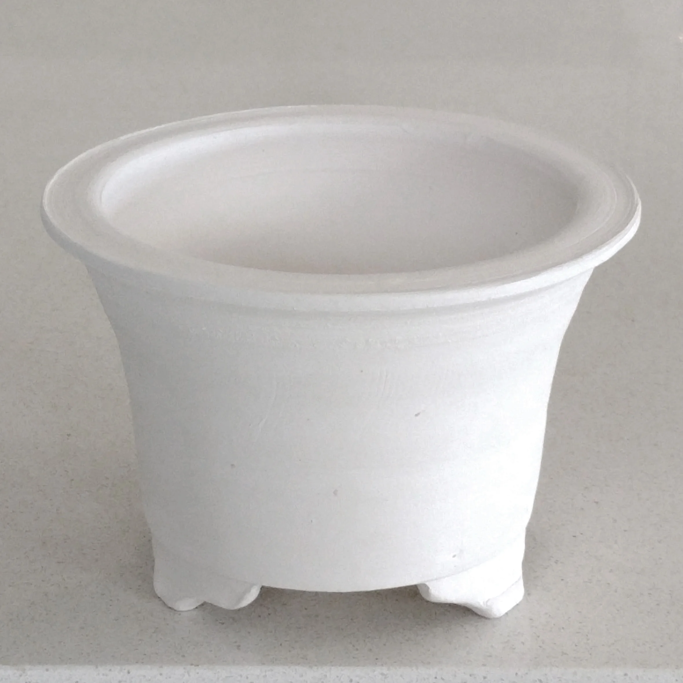 My "blank canvas" is made of white stoneware clay fired to 1000°C.
