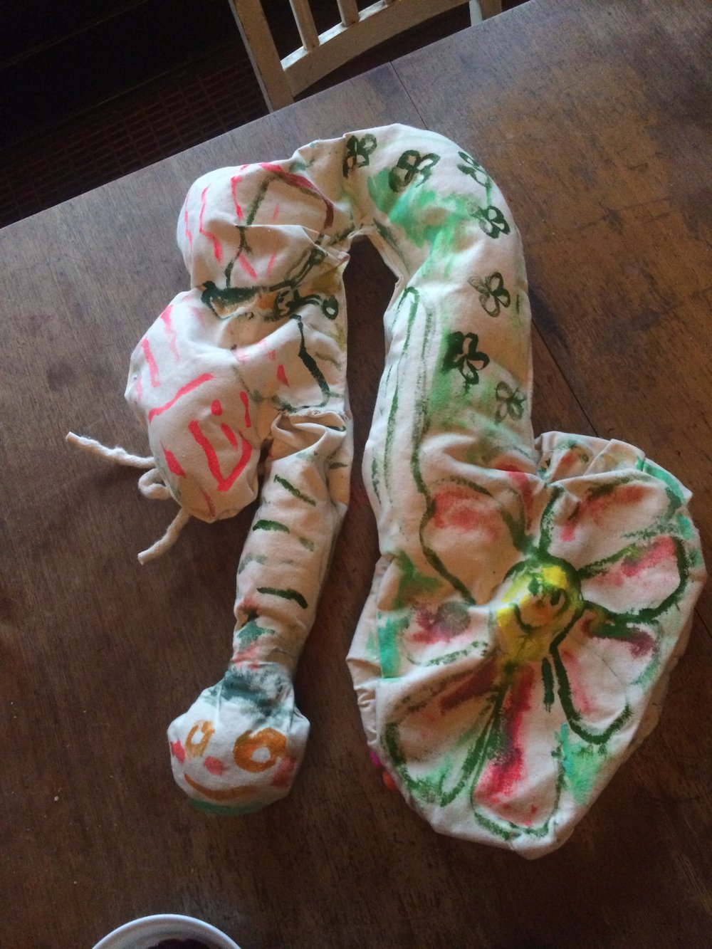 Another make-in-one-evening creation. A bachelorette party sash for Barbara. I fashioned up a dick-in-the-ear scuba style bouquet sash of sorts. When the dick is pulled out of the ear there’s a trickle of pee. When the trickle is yanked it becomes a golden shower. Untie the pouchy nut sack and semen release, of course. On the flip side squirms a painted worm and bouncy butterfly among blooming blossoms. I truly love making random things for friends.