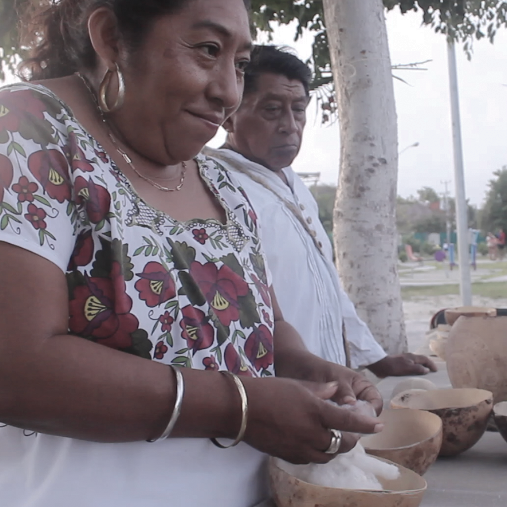 BEATRIZ POOT She is one of the very few women who rescues an ancient technique of Native Maya Cotton Yarn called "Pechech" in the Yucatan Peninsula; it seeks to promote the revaluation of native cotton yarn among women and girls in the Mayan Zone, to avoid the loss of this traditional knowledge. This artisan activity is a spell of the original embroidery of existence.