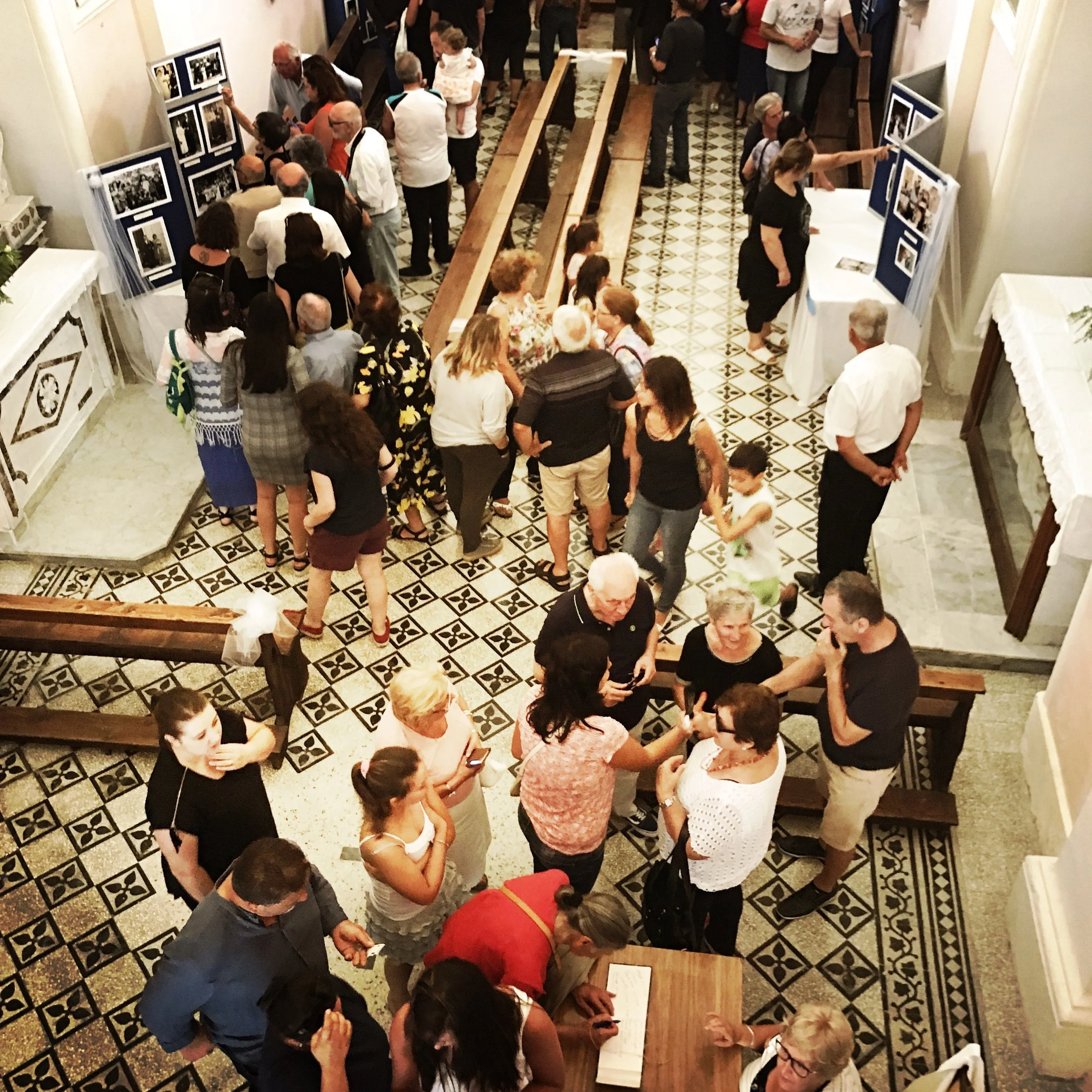 Visitors signing comments book on opening day