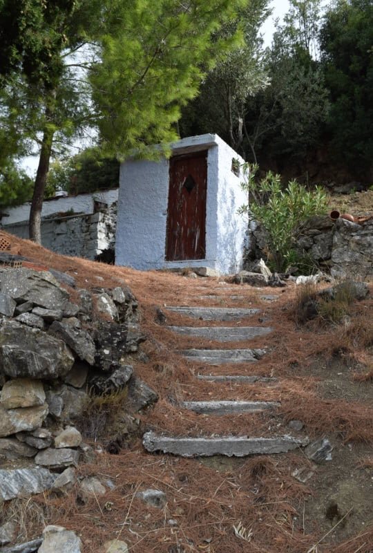 Land_with_small_farmhouse_and_small_building_steps.jpg