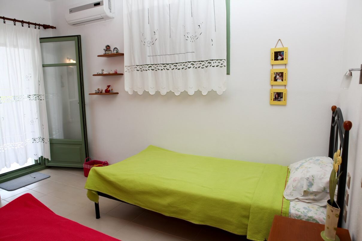 three_bedroom_villa_above_loutraki_bedroom_single_beds_other_side.jpg