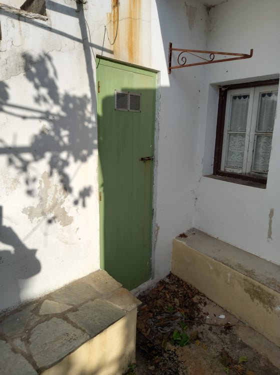 enchanting_farmhouse_with_courtyard_toilet_door.jpg
