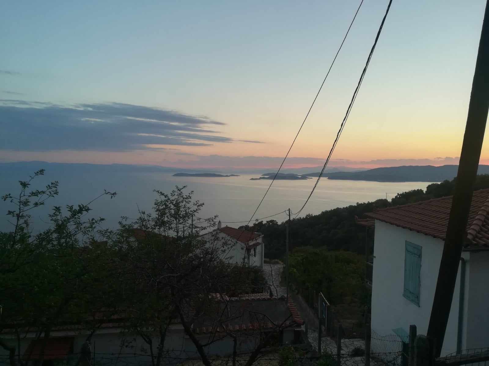 Traditional_house in_Glossa_with_a sea_view_sky_view.jpg