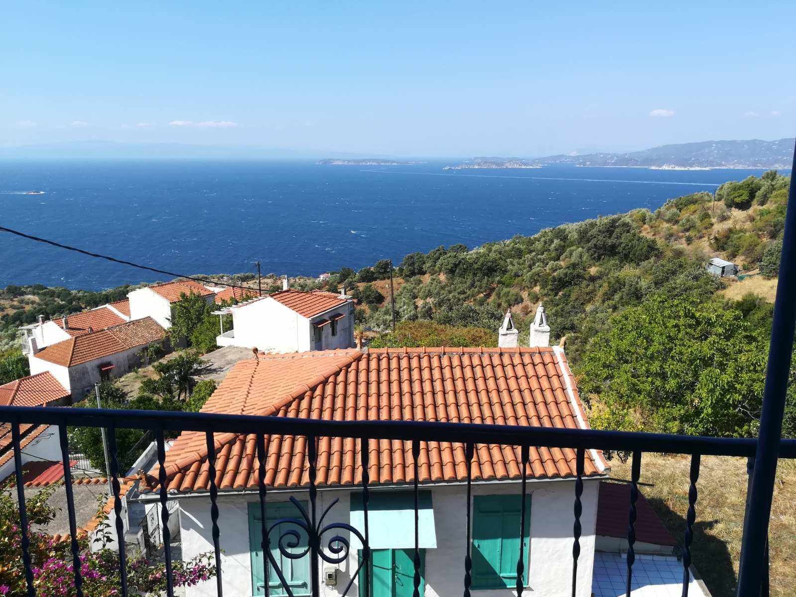 Traditional_house in_Glossa_with_a sea_view_view.jpg