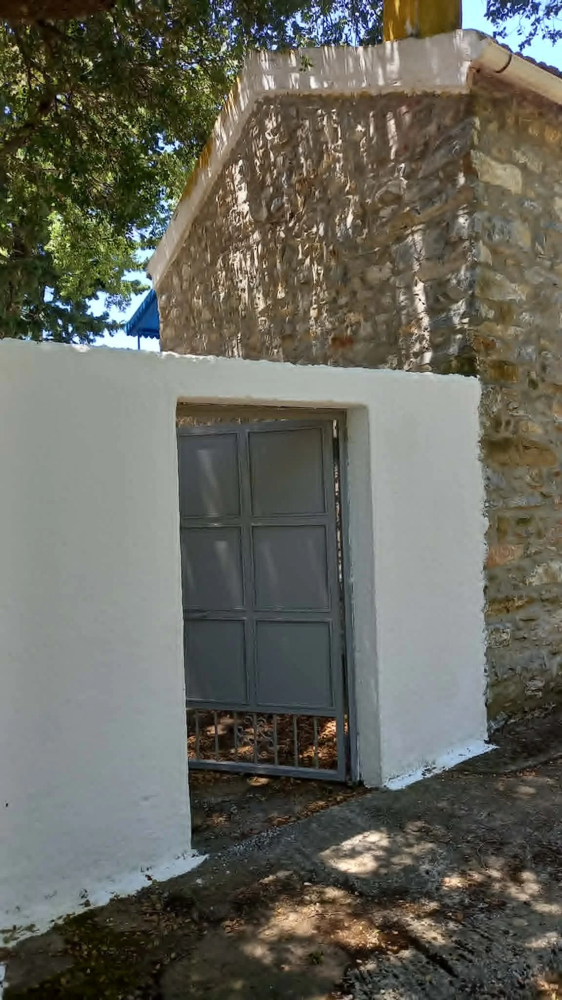 a_farmhouse_a_cabin_and_a_church_door_grey.jpg