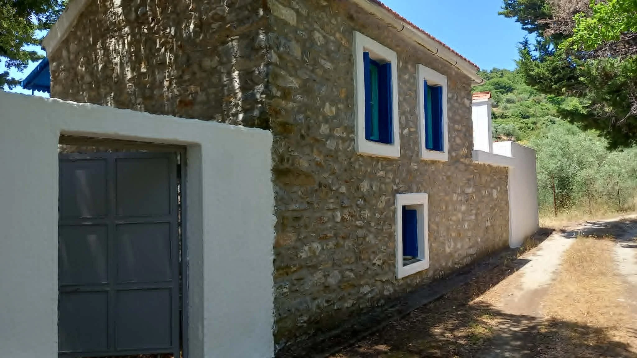 a_farmhouse_a_cabin_and_a_church_windows.jpg