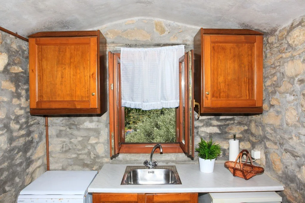 a_farmhouse_a_cabin_and_a_church_cabinets.jpg