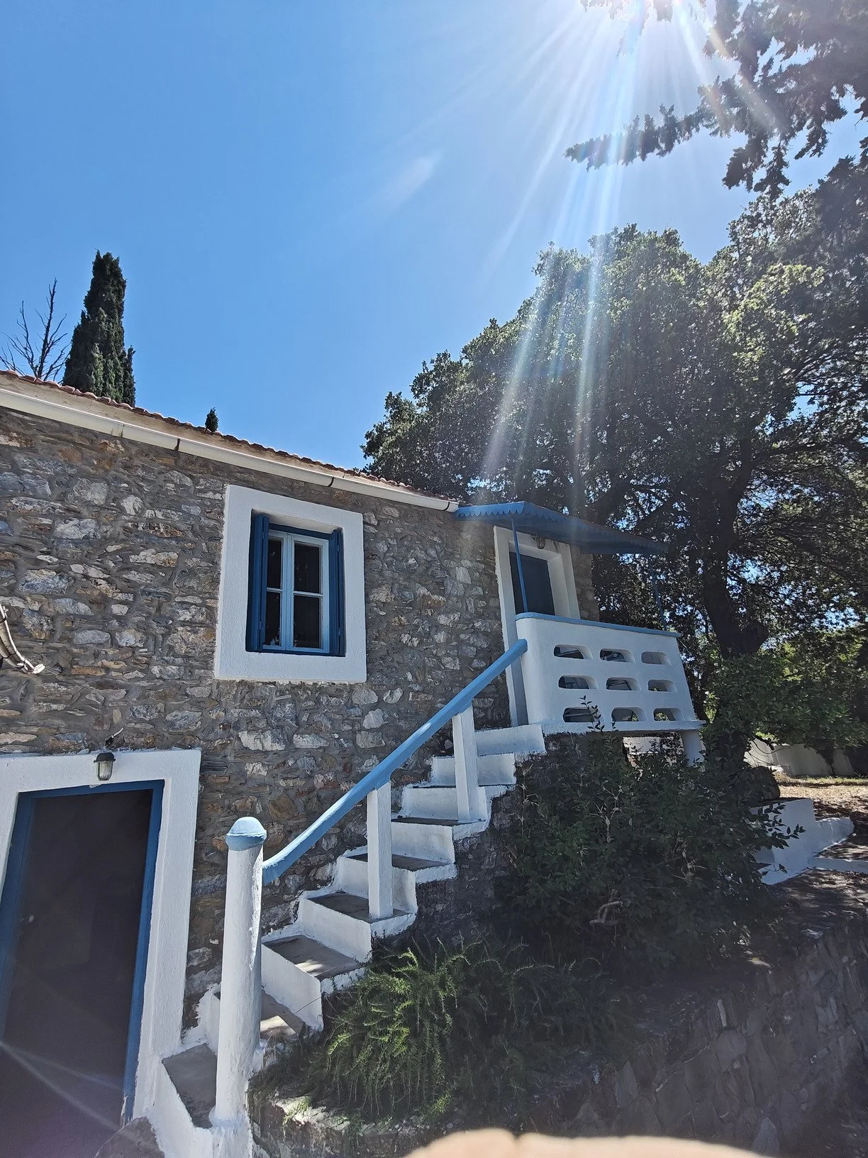 a_farmhouse_a_cabin_and_a_church_sun.jpg