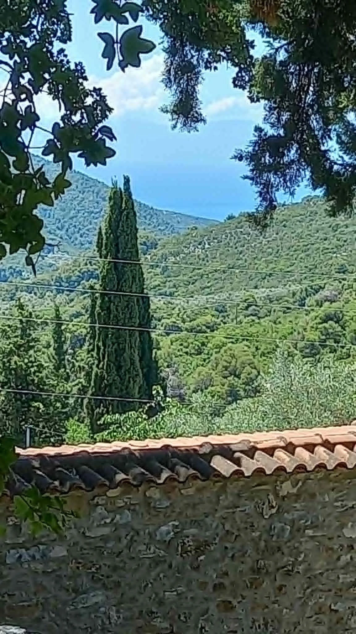 a_farmhouse_a_cabin_and_a_church_blue_sea.jpg