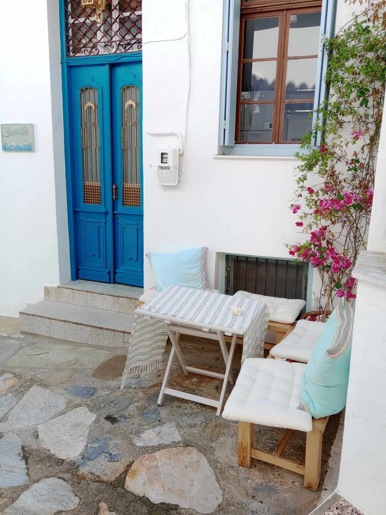 Gorgeous_historic townhouse_with_a_view_outside_chairs.jpg