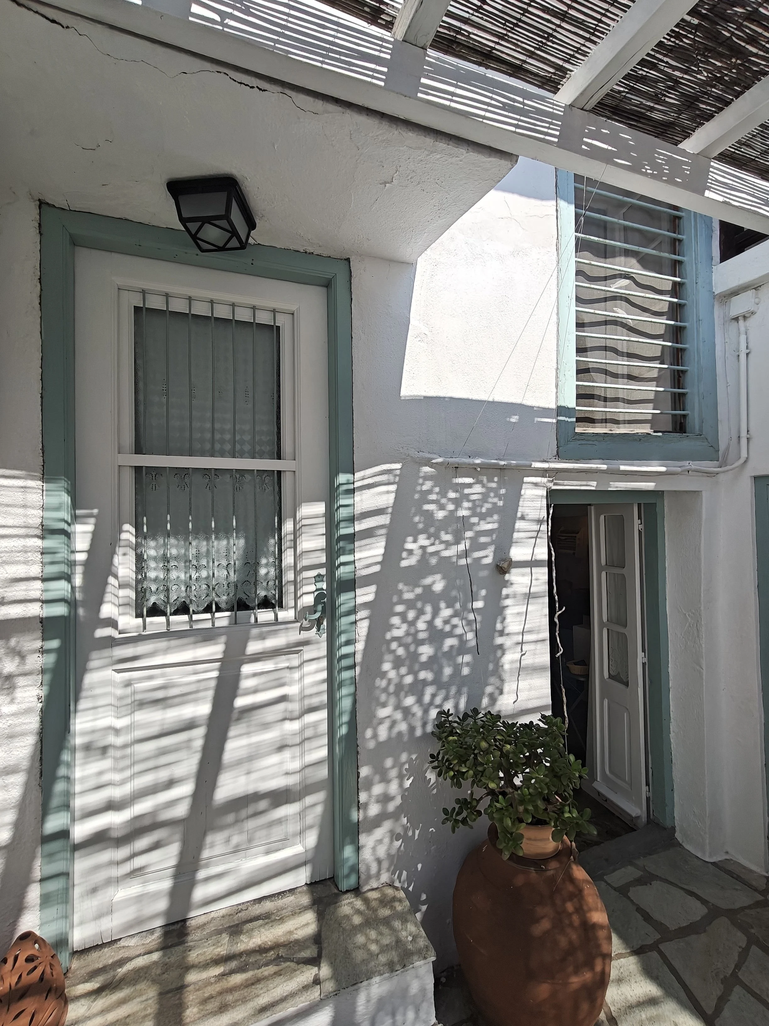charming_greek_style_house_with_outside_spaces_door.jpg