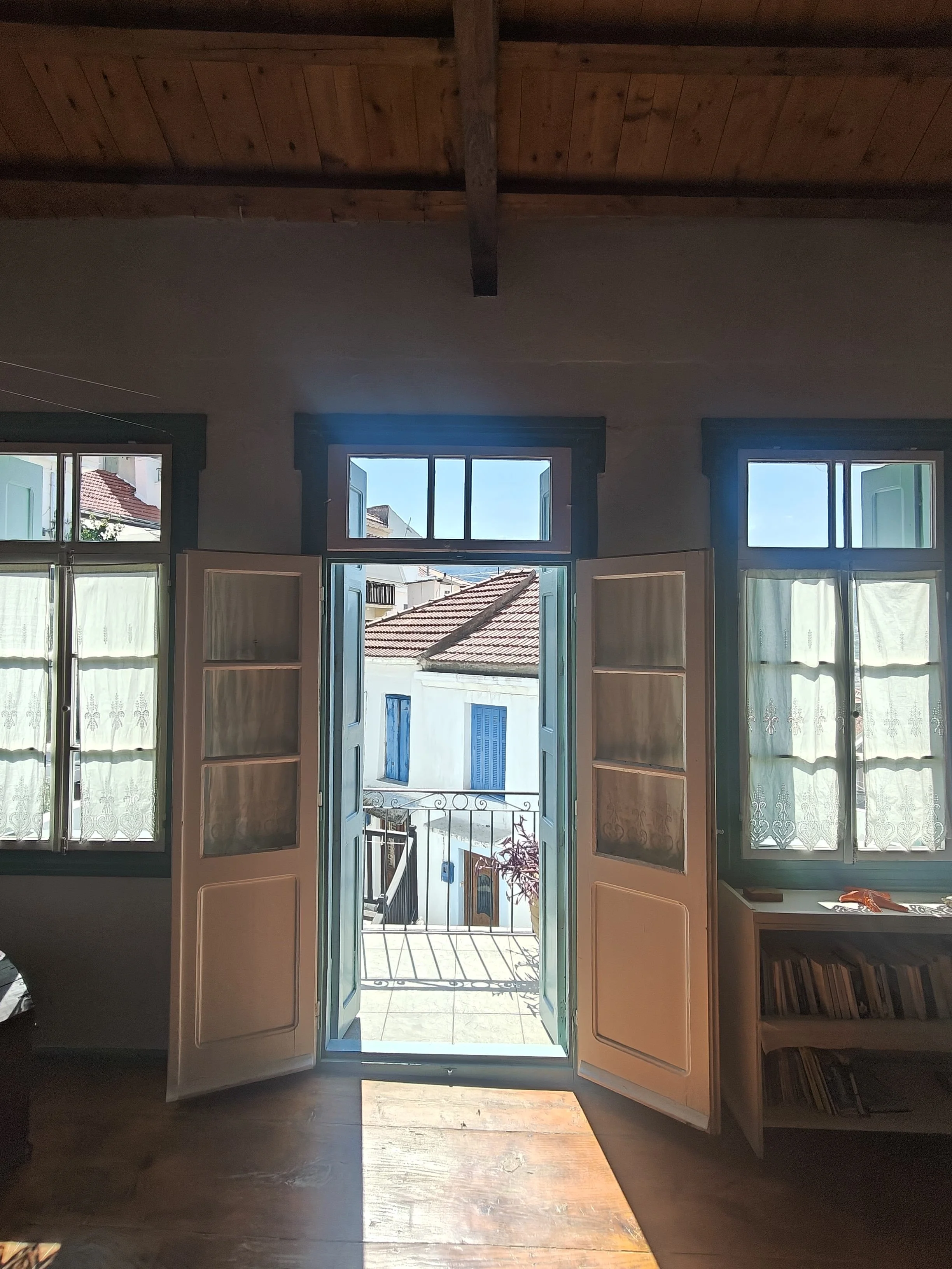 charming_greek_style_house_with_outside_spaces_doors.jpg