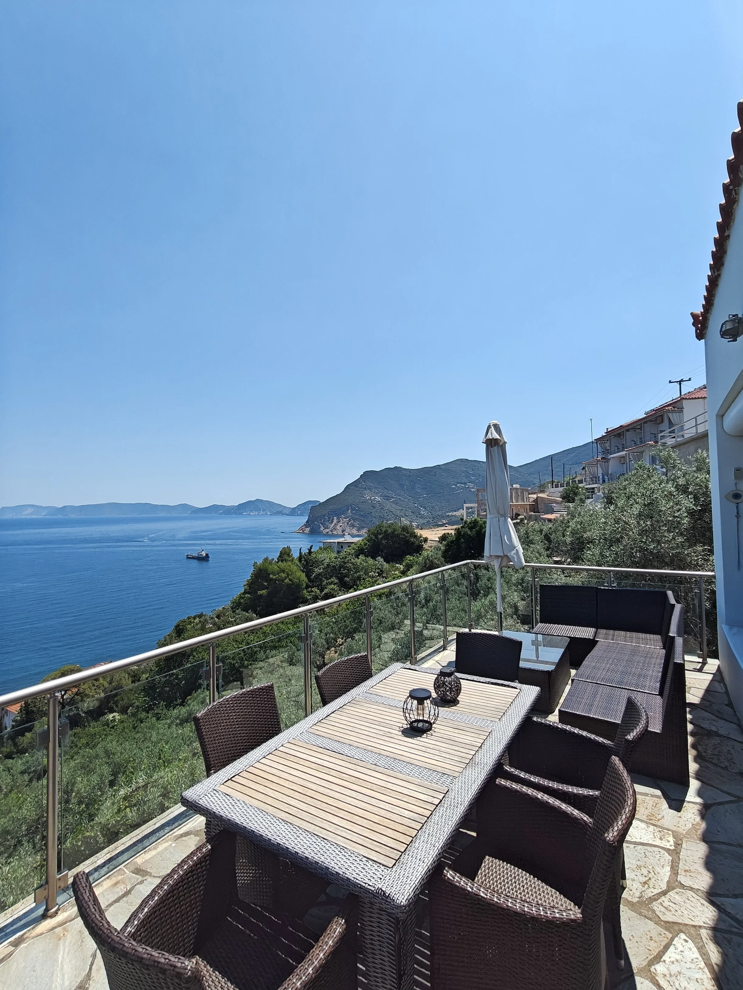  Stunning_villa_with_a _breathtaking_ panoramic_sea_ view_chair.jpg