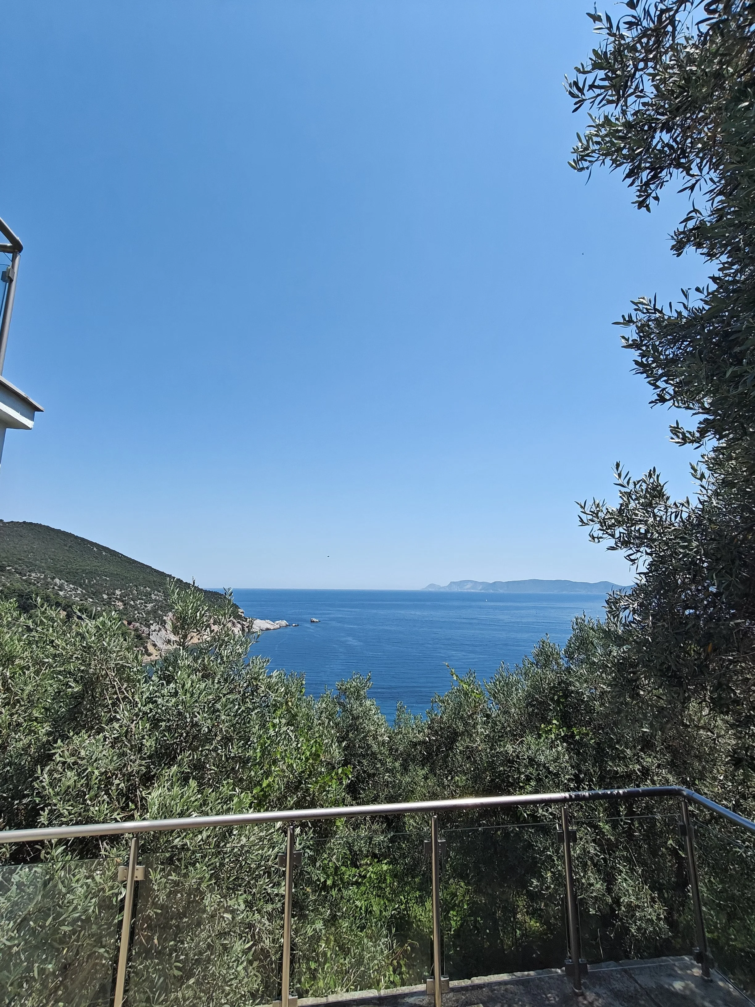  Stunning_villa_with_a _breathtaking_ panoramic_sea_ view_view_downstairs.jpg