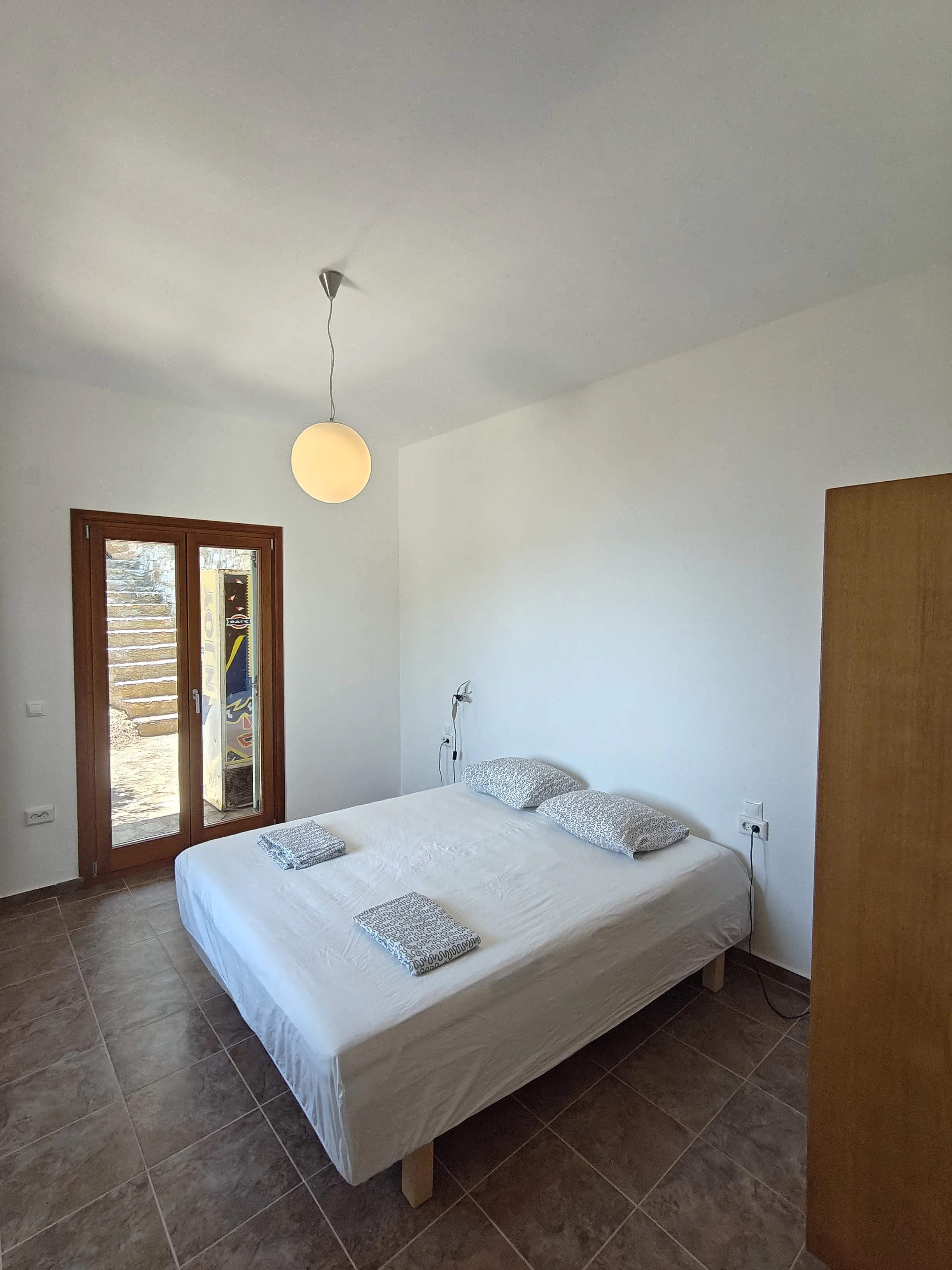  Stunning_villa_with_a_breathtaking_ panoramic_sea_ view_first_bedroom _downstairs2.jpg