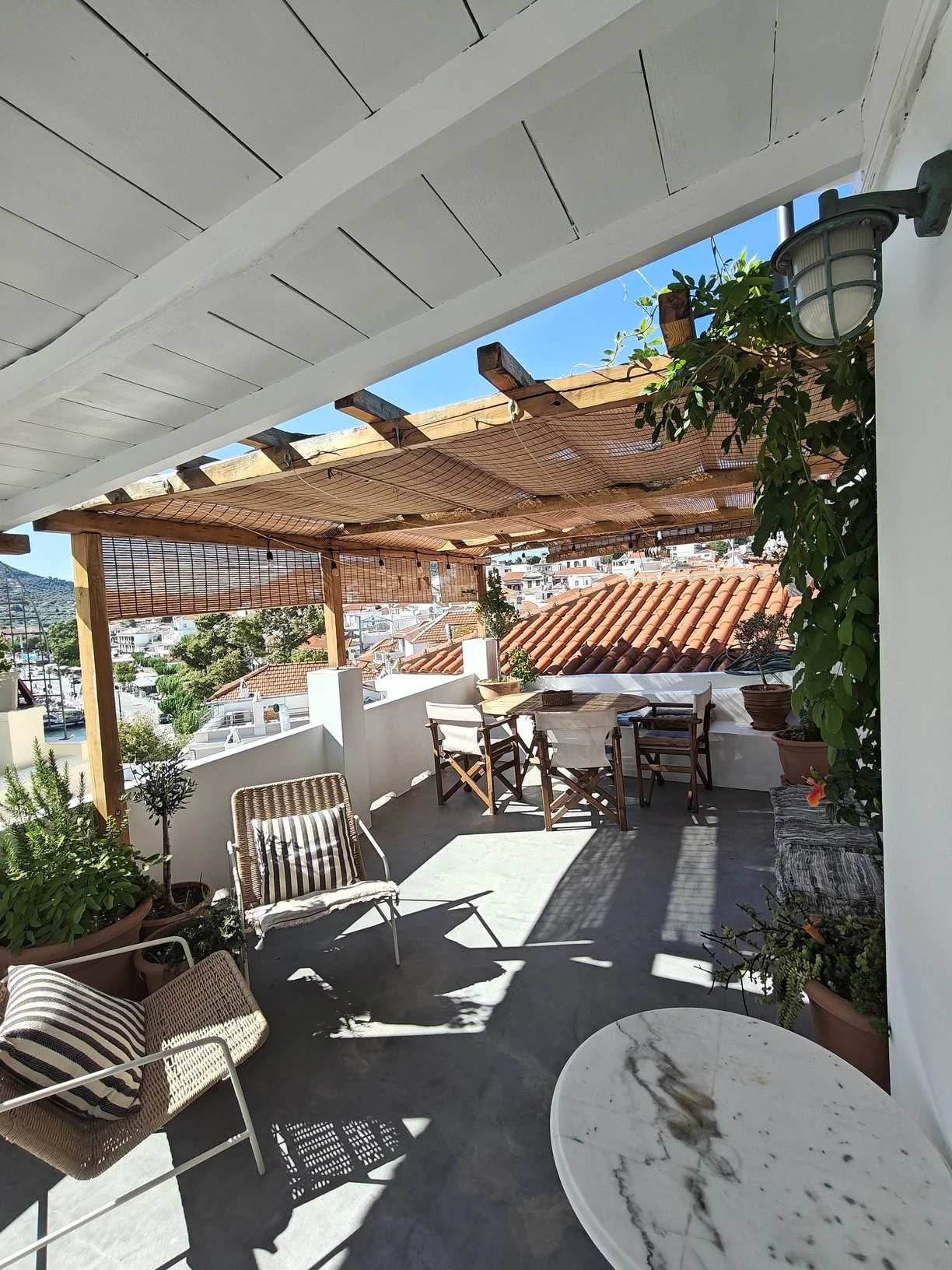 delightful_renovated_three_storey_house_with_ astonishing_roof_terrace_chairs.jpg