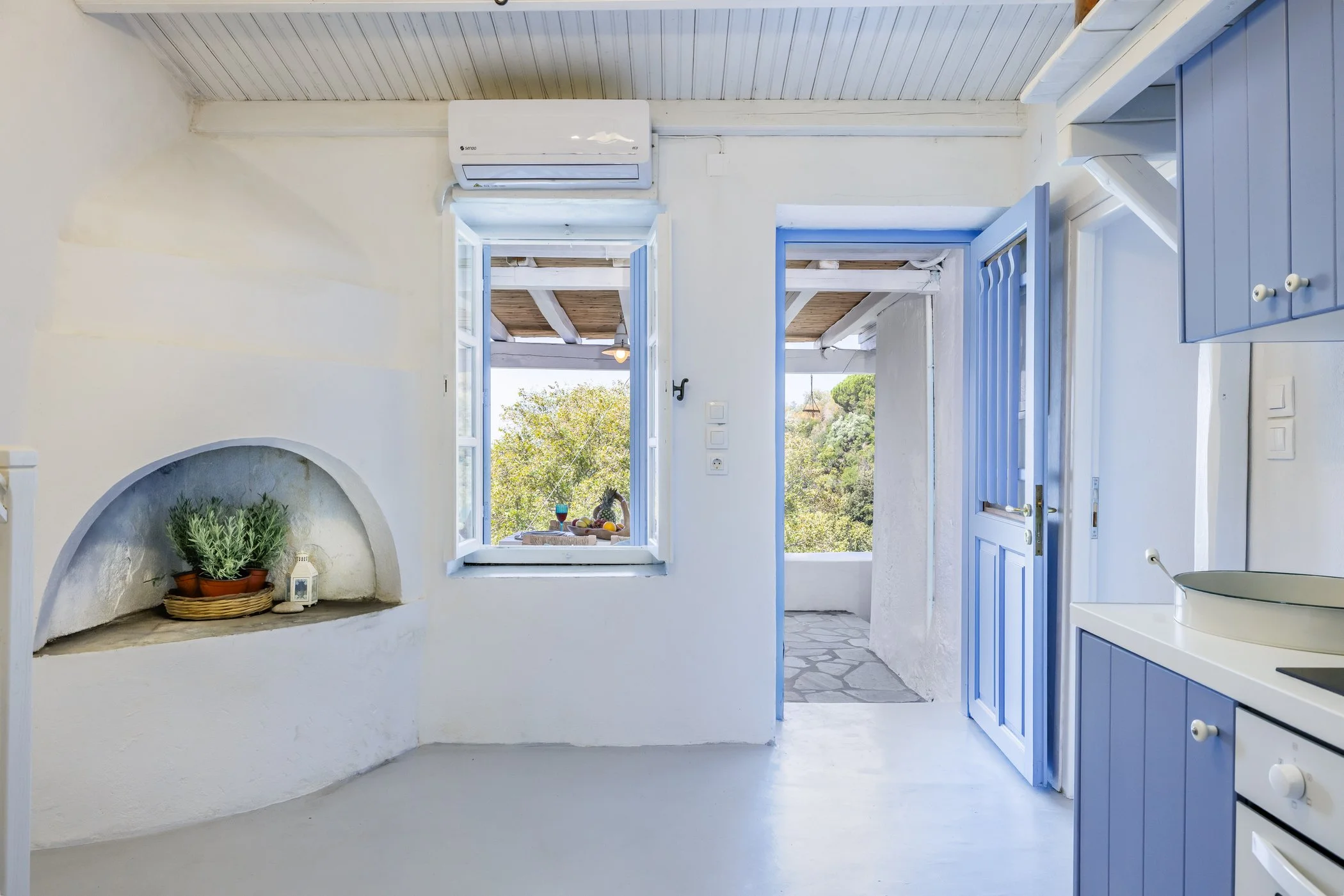completely_renovated_house_below_glossa_plants.jpg
