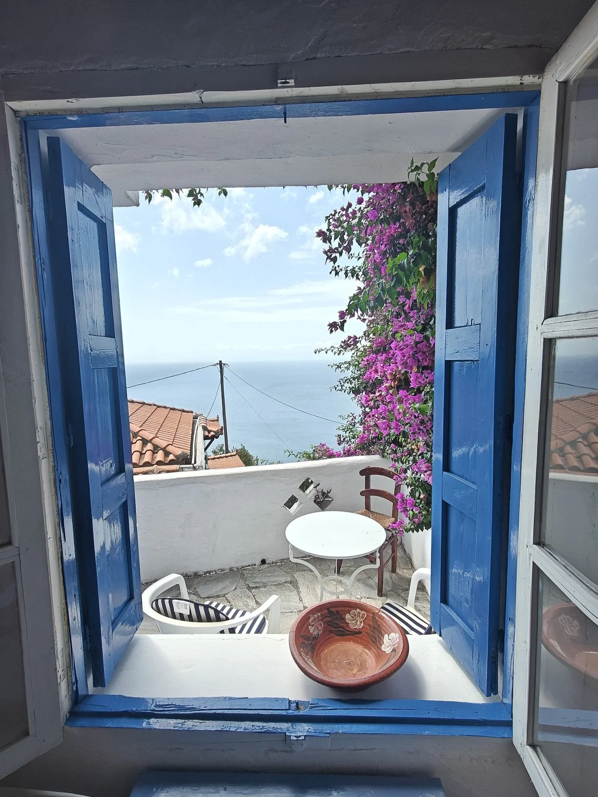 traditional_cozy_house_in_palio_klima_shutter.jpg