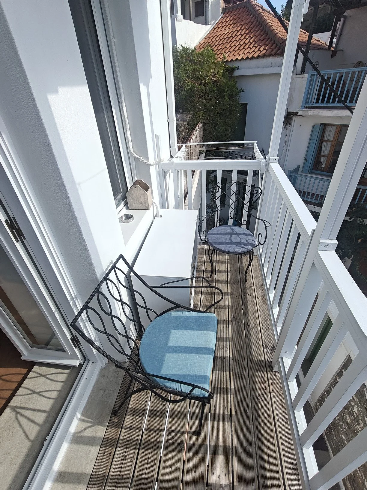 renovated_three_story_wood_based_house_balcony.jpg