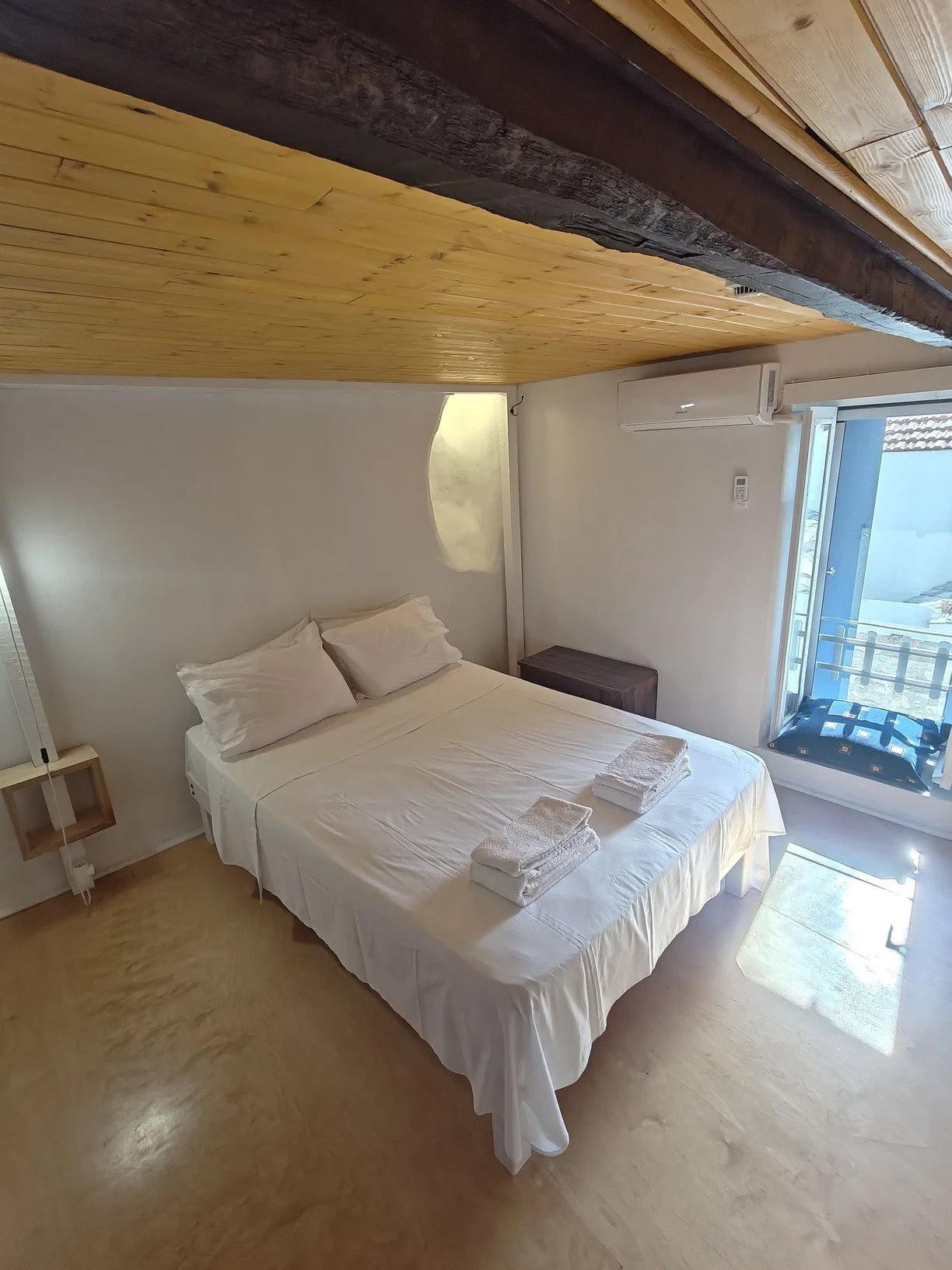 renovated_three_story_wood_based_house_bed.jpg