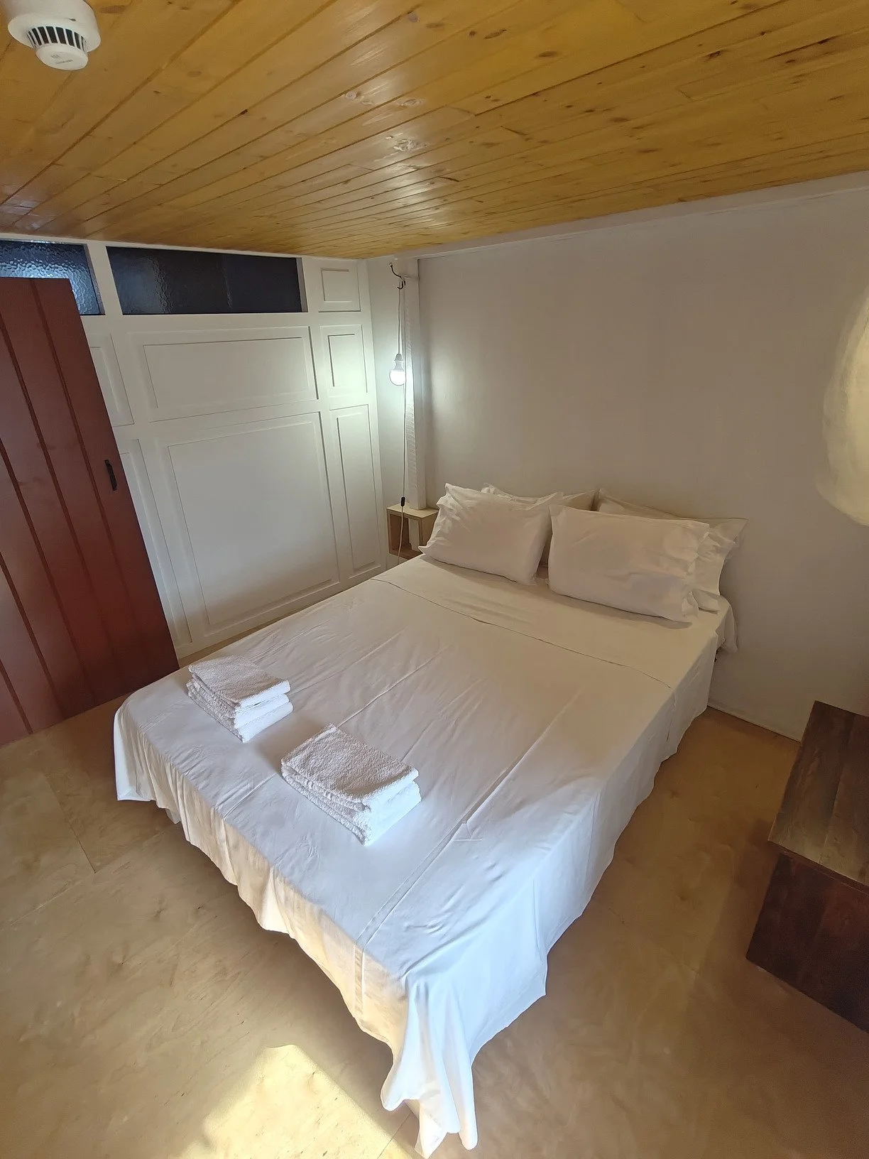 renovated_three_story_wood_based_house_bedroom.jpg