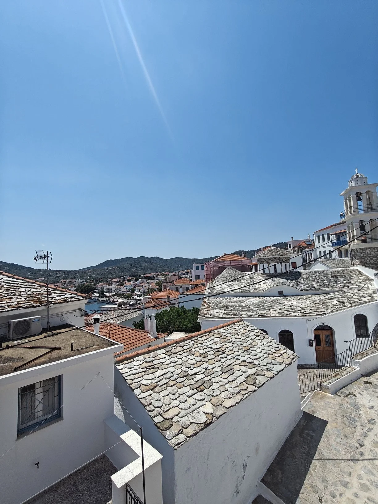 adorable_house_with_a_seaview_church.jpg