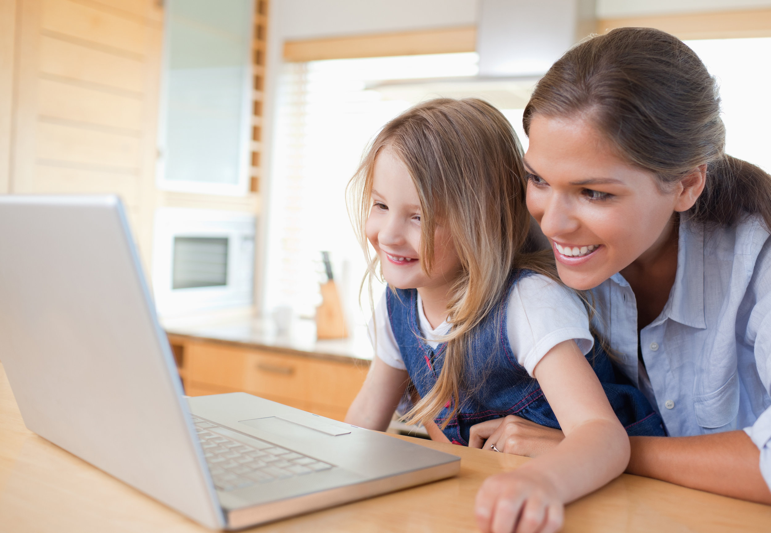 Mom-daughter-laptop-kitchen.jpg