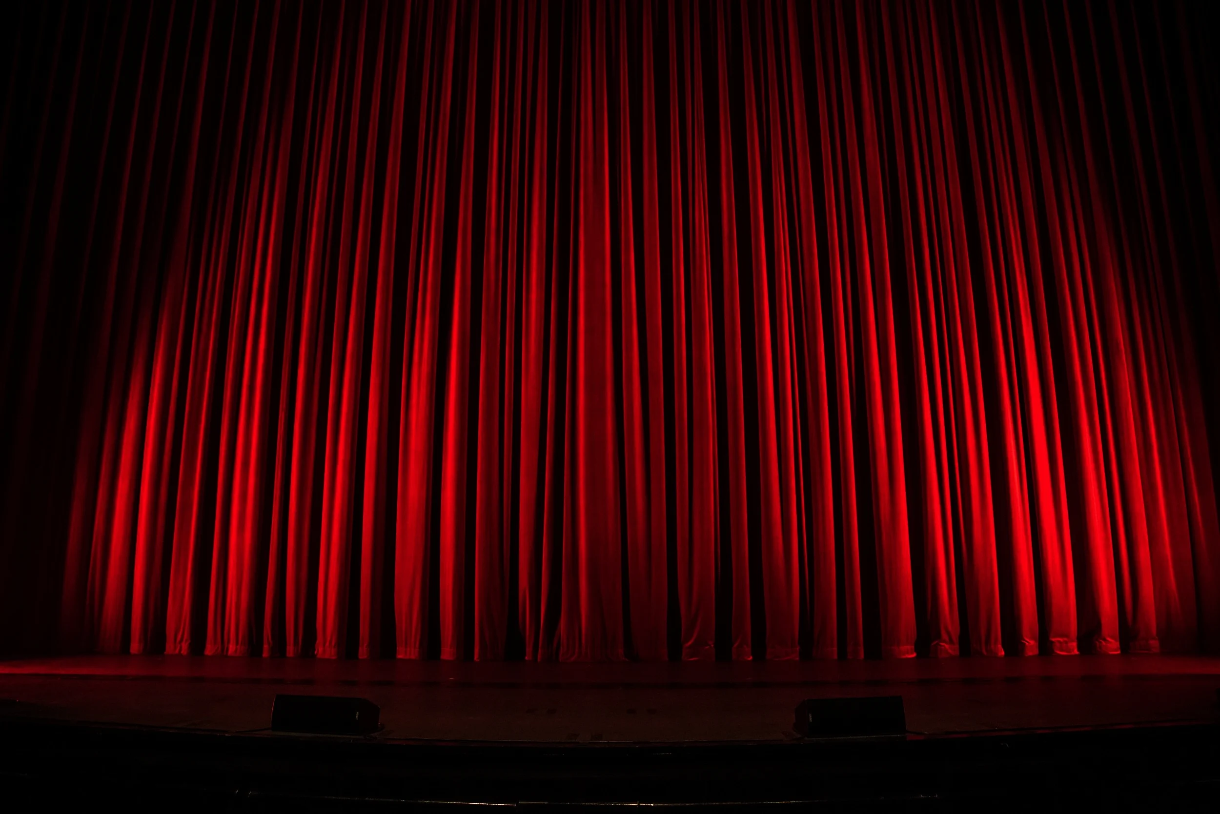 Red-Curtain-rob-laughter-491252-unsplash.jpg
