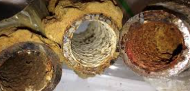 Flint drinking water pipes which show iron corrosion and rust Photo Credit Min Tang & Kelsey Pieper