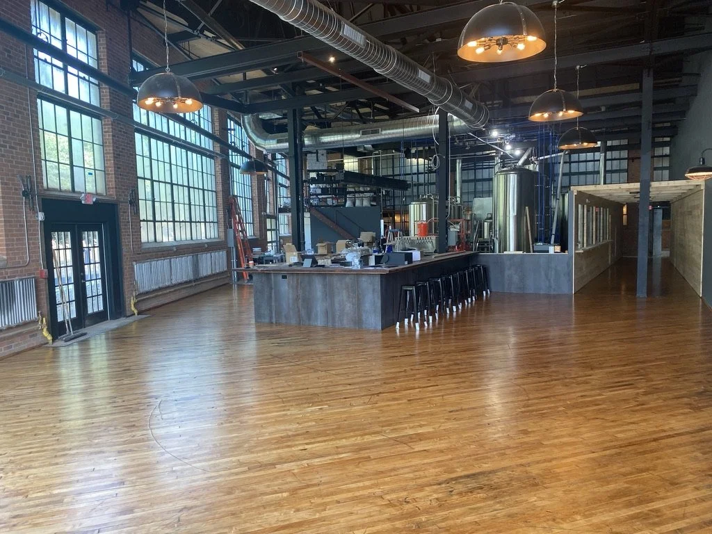 Refinished natural hardwood floor in a converted warehouse brewery in South Norwalk, CT